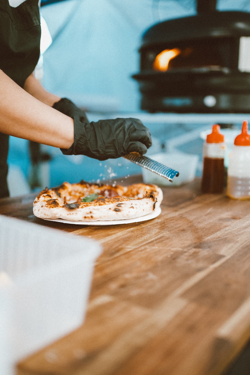 Close-up of pizza making